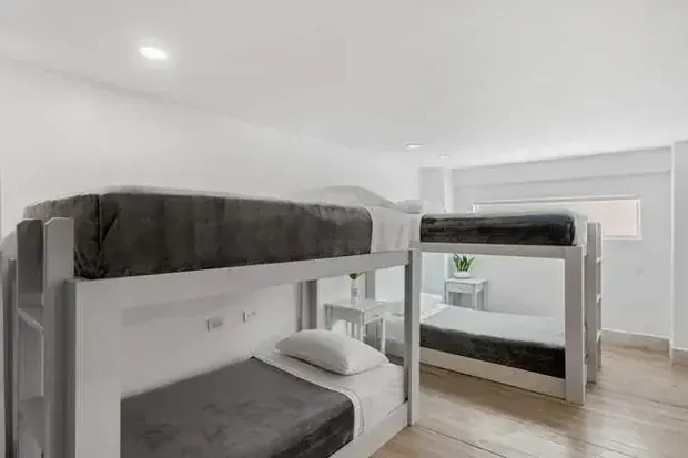 Bunk beds in the Shared Surf Dorm at Iguana Surf